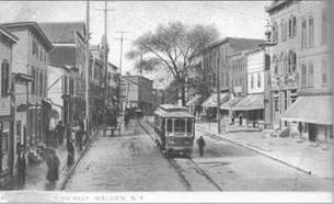 A trolley on a street

Description automatically generated